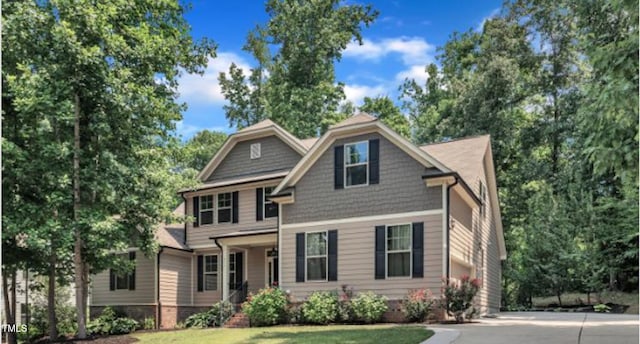 211 Camille Cir, Youngsville, NC 27596 - view of front of house featuring concrete driveway and a front lawn