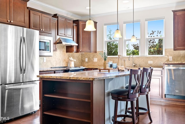 325 Currituck Ln, Durham, NC 27703 - kitchen featuring stainless steel appliances, open shelves, under cabinet range hood, a kitchen island, and ornamental molding