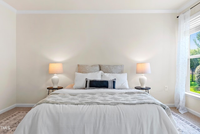 325 Currituck Ln, Durham, NC 27703 - carpeted bedroom with multiple windows and crown molding