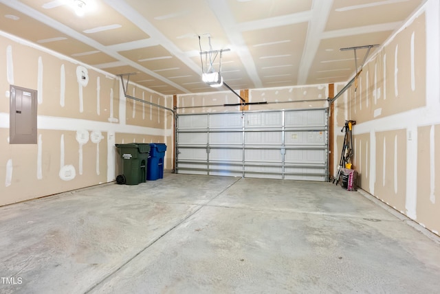 325 Currituck Ln, Durham, NC 27703 - garage featuring electric panel and a garage door opener