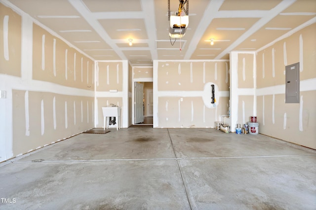 325 Currituck Ln, Durham, NC 27703 - garage with electric panel and a garage door opener