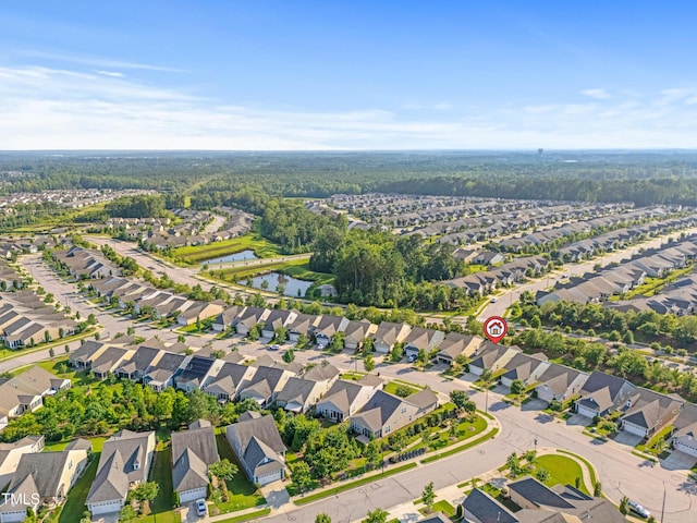 325 Currituck Ln, Durham, NC 27703 - aerial view of property and surrounding area with nearby suburban area and a large body of water