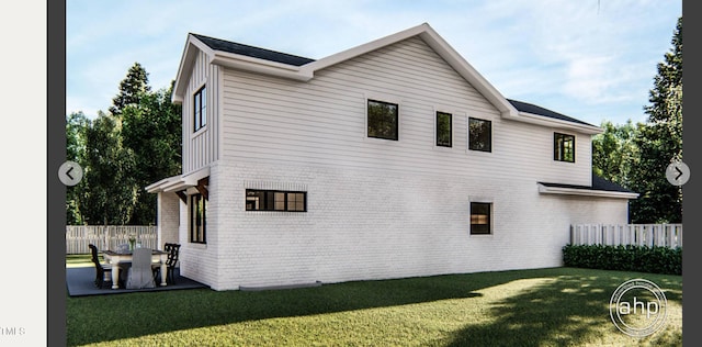 8014 Penny Rd, Raleigh, NC 27606 - view of property exterior featuring brick siding and a patio