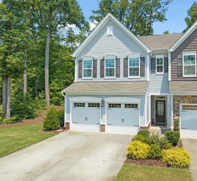 401 Summit Trail Dr, Hillsborough, NC 27278 - view of front of house with a garage, concrete driveway, and roof with shingles