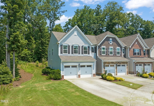 401 Summit Trail Dr, Hillsborough, NC 27278 - view of front of house featuring concrete driveway, a garage, and a front lawn