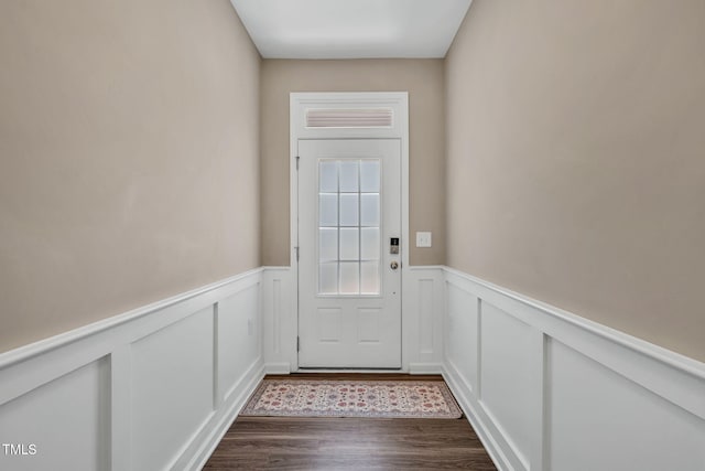 401 Summit Trail Dr, Hillsborough, NC 27278 - entryway featuring dark wood-style floors, a wainscoted wall, and a decorative wall