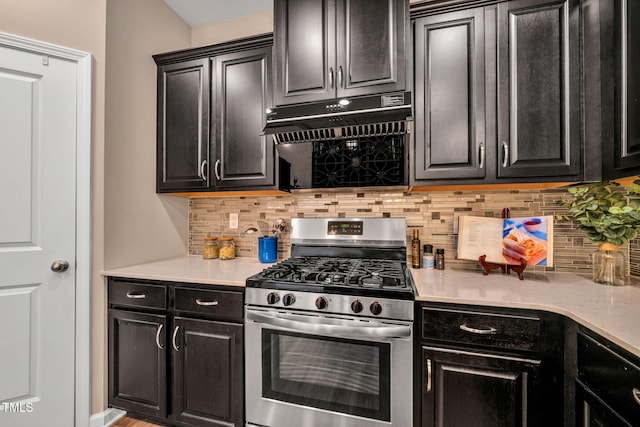 401 Summit Trail Dr, Hillsborough, NC 27278 - kitchen featuring stainless steel range with gas cooktop, dark cabinets, and backsplash