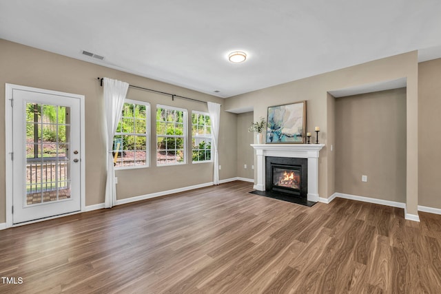 401 Summit Trail Dr, Hillsborough, NC 27278 - unfurnished living room featuring wood finished floors and a fireplace with flush hearth