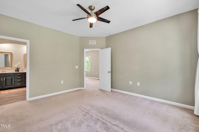 401 Summit Trail Dr, Hillsborough, NC 27278 - unfurnished bedroom with light carpet, ensuite bath, and ceiling fan