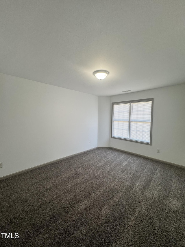 2907 S S Roxboro St, Durham, NC 27707 - unfurnished room featuring dark carpet and baseboards