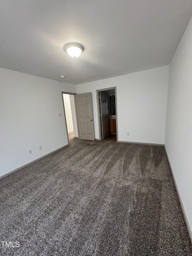 2907 S S Roxboro St, Durham, NC 27707 - unfurnished bedroom featuring carpet flooring and baseboards