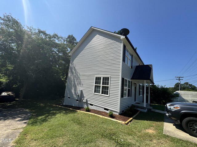 2907 S S Roxboro St, Durham, NC 27707 - view of side of home with crawl space and a yard