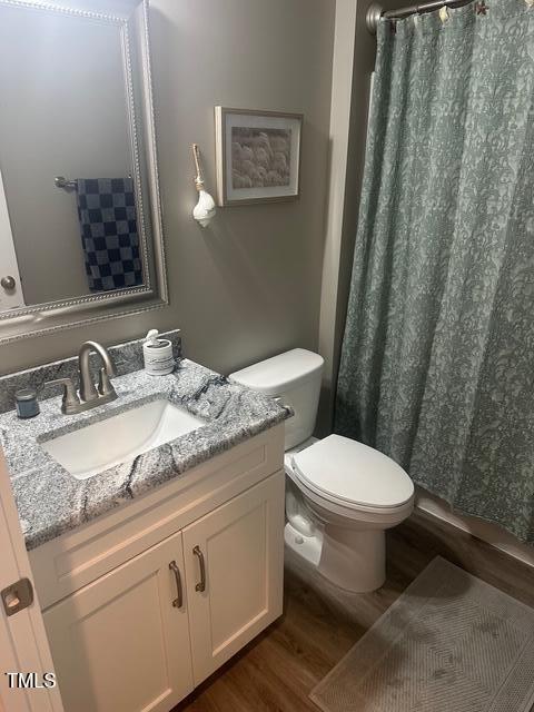 8 Open View Ln, Timberlake, NC 27583 - bathroom with wood finished floors, vanity, and curtained shower