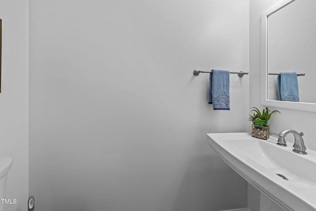 1035 High Lake Ct, Raleigh, NC 27606 - bathroom featuring a sink and toilet
