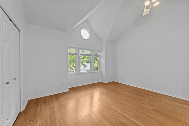 1035 High Lake Ct, Raleigh, NC 27606 - unfurnished bedroom with light wood-style floors, lofted ceiling, a closet, and ceiling fan