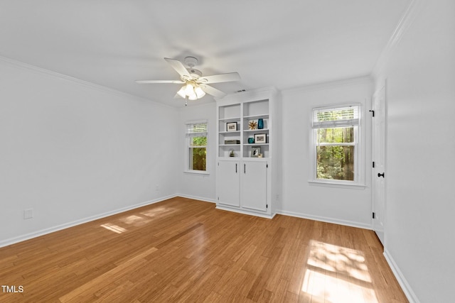 1035 High Lake Ct, Raleigh, NC 27606 - empty room featuring light wood-type flooring, ornamental molding, and a ceiling fan