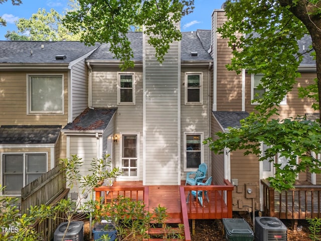 1035 High Lake Ct, Raleigh, NC 27606 - rear view of property featuring a deck and a chimney