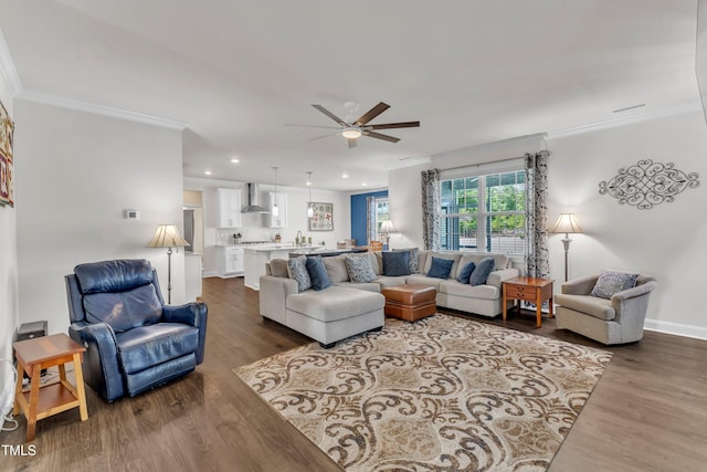 1021 Clove Pine Dr, Knightdale, NC 27545 - living area featuring crown molding, ceiling fan, dark wood-style floors, and recessed lighting
