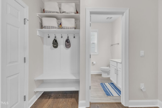 1021 Clove Pine Dr, Knightdale, NC 27545 - mudroom featuring baseboards and wood finished floors