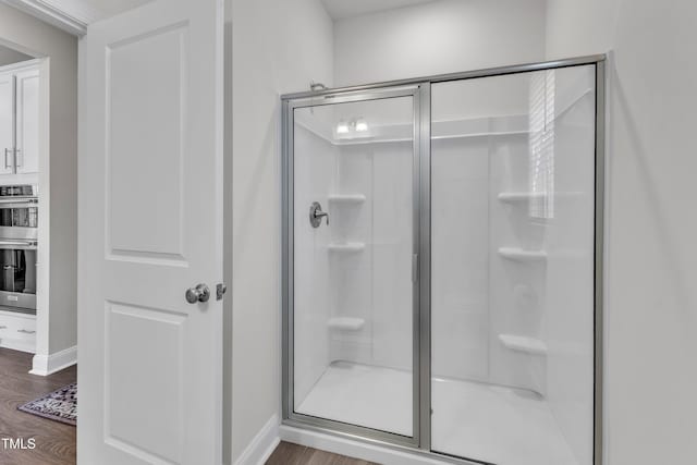 1021 Clove Pine Dr, Knightdale, NC 27545 - bathroom with a stall shower and wood finished floors