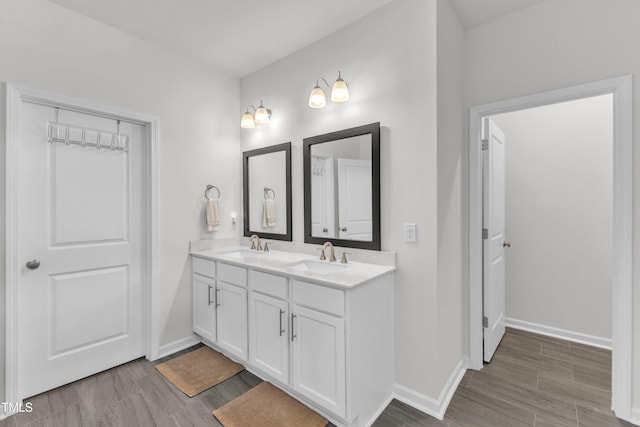 1021 Clove Pine Dr, Knightdale, NC 27545 - full bath featuring double vanity and wood finished floors
