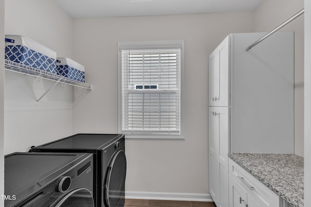 1021 Clove Pine Dr, Knightdale, NC 27545 - washroom with washing machine and dryer and cabinet space