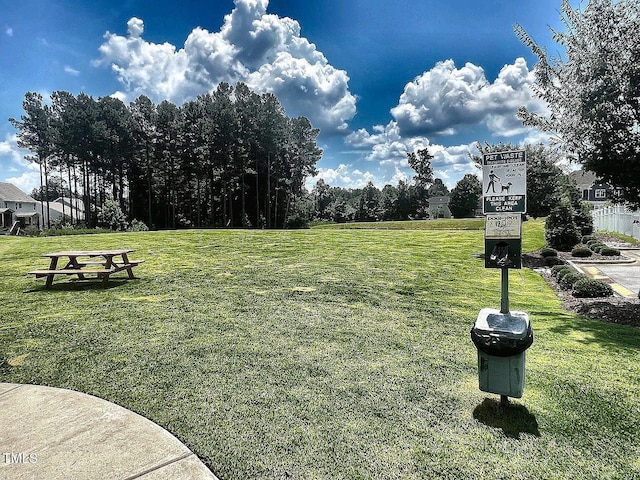 1021 Clove Pine Dr, Knightdale, NC 27545 - surrounding community with a yard