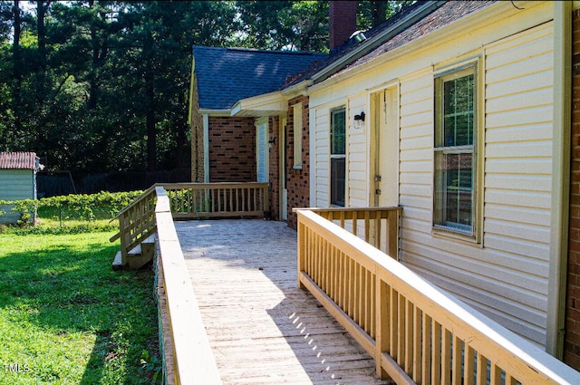 2001 Thomas Ln, Henderson, NC 27536 - deck featuring a lawn