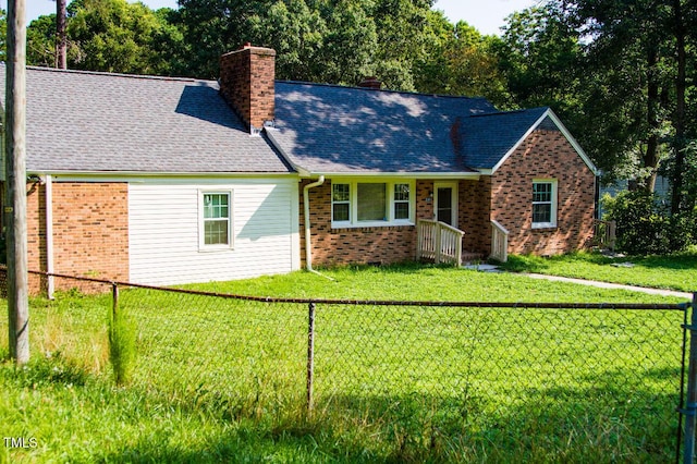 2001 Thomas Ln, Henderson, NC 27536 - ranch-style house with a chimney, brick siding, and a fenced backyard