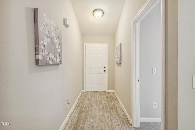 3050 Trailwood Pines Ln Unit 303, Raleigh, NC 27603 - hall with wood finished floors and baseboards