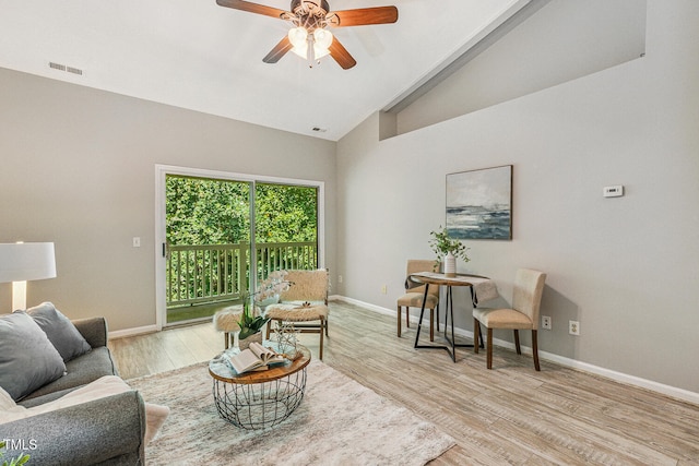3050 Trailwood Pines Ln Unit 303, Raleigh, NC 27603 - living room featuring a ceiling fan, wood finished floors, and high vaulted ceiling