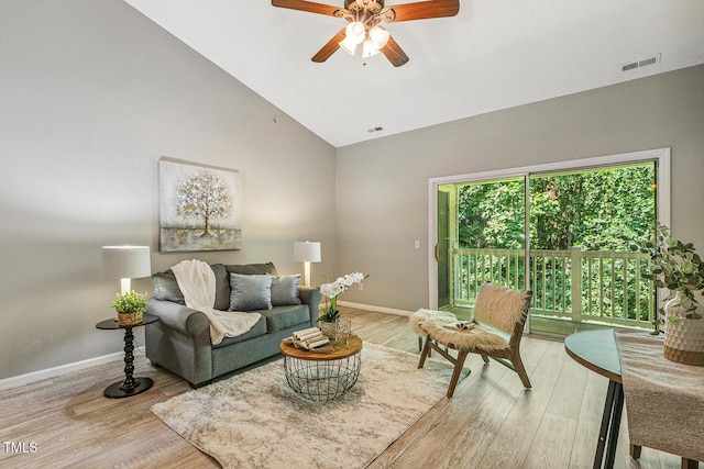 3050 Trailwood Pines Ln Unit 303, Raleigh, NC 27603 - living area with high vaulted ceiling, a ceiling fan, and light wood finished floors