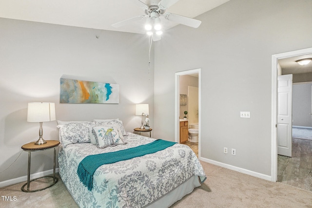 3050 Trailwood Pines Ln Unit 303, Raleigh, NC 27603 - bedroom featuring carpet, a high ceiling, connected bathroom, and a ceiling fan