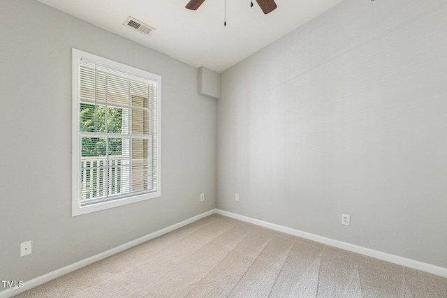 3050 Trailwood Pines Ln Unit 303, Raleigh, NC 27603 - spare room featuring ceiling fan and light colored carpet