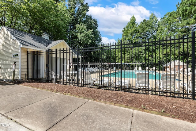 3050 Trailwood Pines Ln Unit 303, Raleigh, NC 27603 - community pool with a patio area