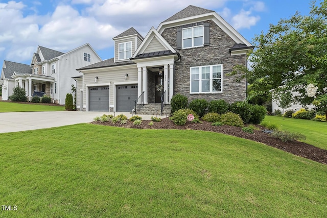 2098 Amalfi Pl, Apex, NC 27502 - view of front of house featuring a front yard, driveway, stone siding, a standing seam roof, and a metal roof