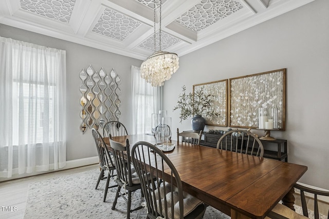 2098 Amalfi Pl, Apex, NC 27502 - dining area featuring coffered ceiling, a chandelier, crown molding, light wood-style flooring, and beamed ceiling