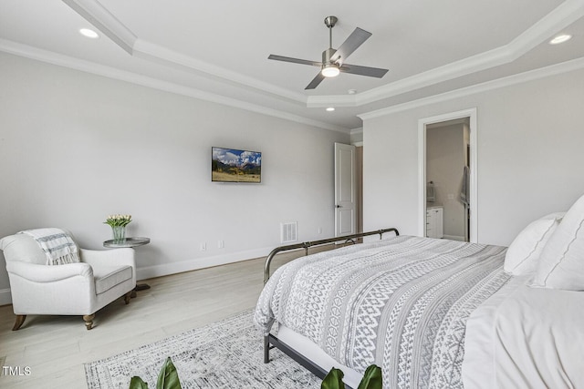 2098 Amalfi Pl, Apex, NC 27502 - bedroom with a raised ceiling, wood finished floors, recessed lighting, crown molding, and a ceiling fan