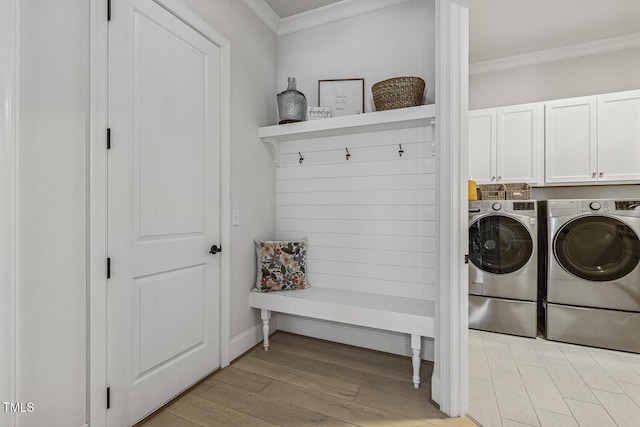 2098 Amalfi Pl, Apex, NC 27502 - mudroom featuring washer and clothes dryer, crown molding, and light wood-type flooring