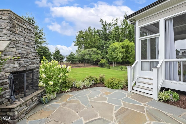 2098 Amalfi Pl, Apex, NC 27502 - view of patio / terrace with an outdoor stone fireplace