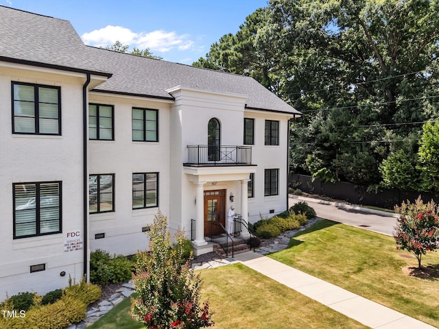 607 Smedes Pl Unit A, Raleigh, NC 27605 - view of front facade with a balcony, crawl space, and a shingled roof
