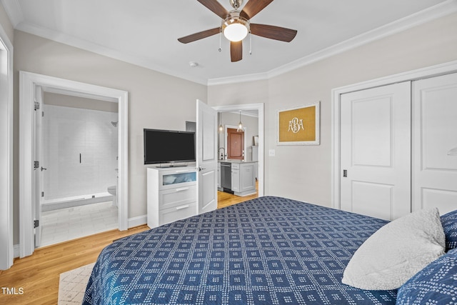 607 Smedes Pl Unit A, Raleigh, NC 27605 - bedroom featuring ornamental molding, light wood finished floors, ensuite bathroom, ceiling fan, and a closet