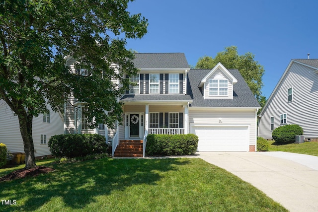 614 Park York Ln, Cary, NC 27519 - view of front facade with concrete driveway, an attached garage, a front yard, and a porch