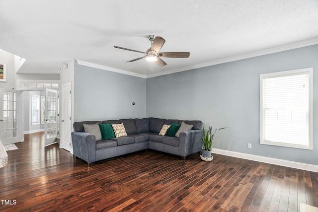 614 Park York Ln, Cary, NC 27519 - living area with dark wood finished floors, ceiling fan, and crown molding