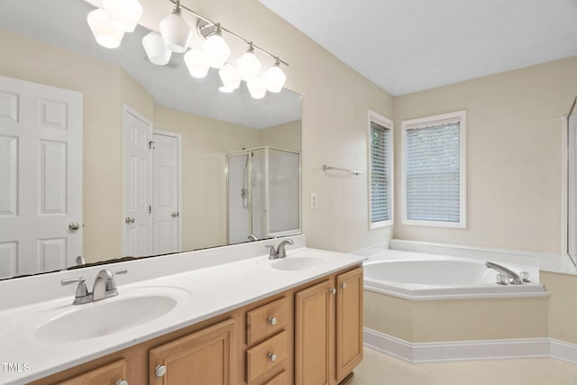 614 Park York Ln, Cary, NC 27519 - bathroom featuring a shower stall, a bath, and double vanity