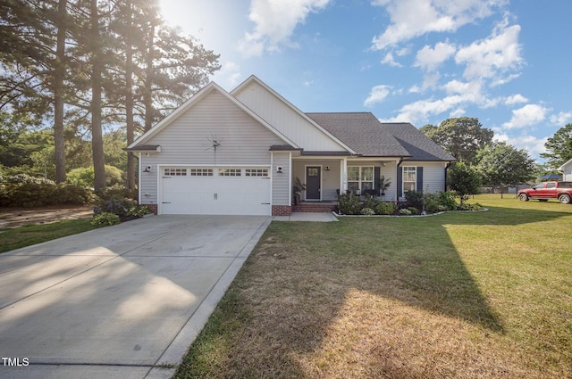 1405 Currituck Ave, Dunn, NC 28334 - single story home with an attached garage, driveway, a front lawn, covered porch, and a shingled roof