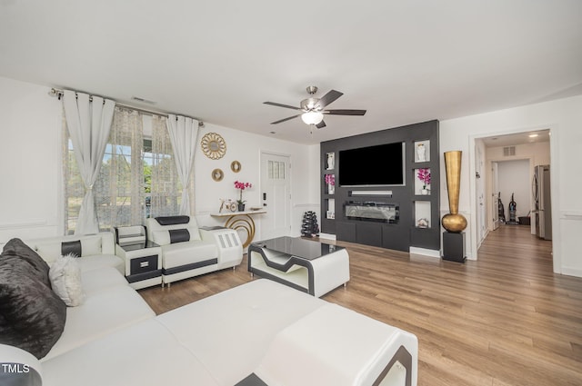 1405 Currituck Ave, Dunn, NC 28334 - living area featuring a ceiling fan and wood finished floors