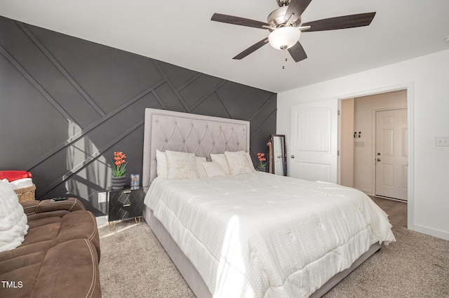 1405 Currituck Ave, Dunn, NC 28334 - bedroom featuring a decorative wall, carpet, and a ceiling fan