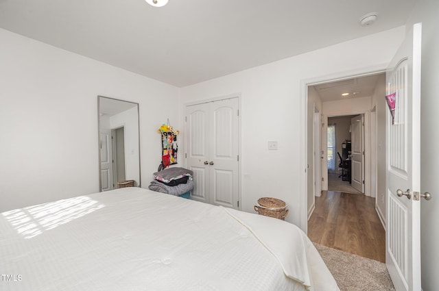 1405 Currituck Ave, Dunn, NC 28334 - bedroom featuring a closet and wood finished floors