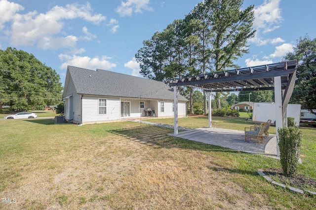 1405 Currituck Ave, Dunn, NC 28334 - rear view of house with a pergola, a yard, a patio, and roof with shingles